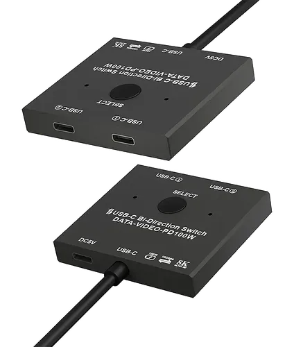 Dois adaptadores USB-C pretos para switch bidirecional de vídeo e dados, sobre fundo branco.
